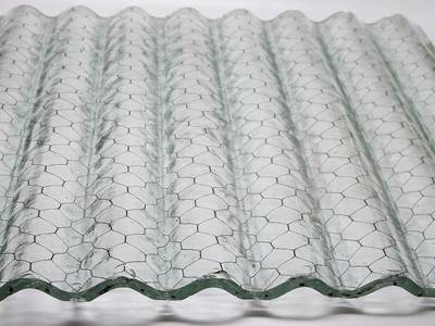 Chicken wire mesh is embedded into glass, which makes itself a clear corrugated glass.