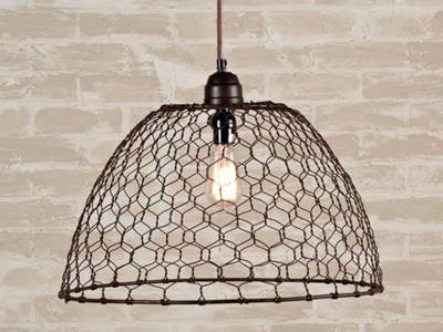Blank coated chicken wire comes into a lampshade for a pendant light.