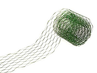 A roll of green chicken wire ribbon is lying there with part of ribbon extended.